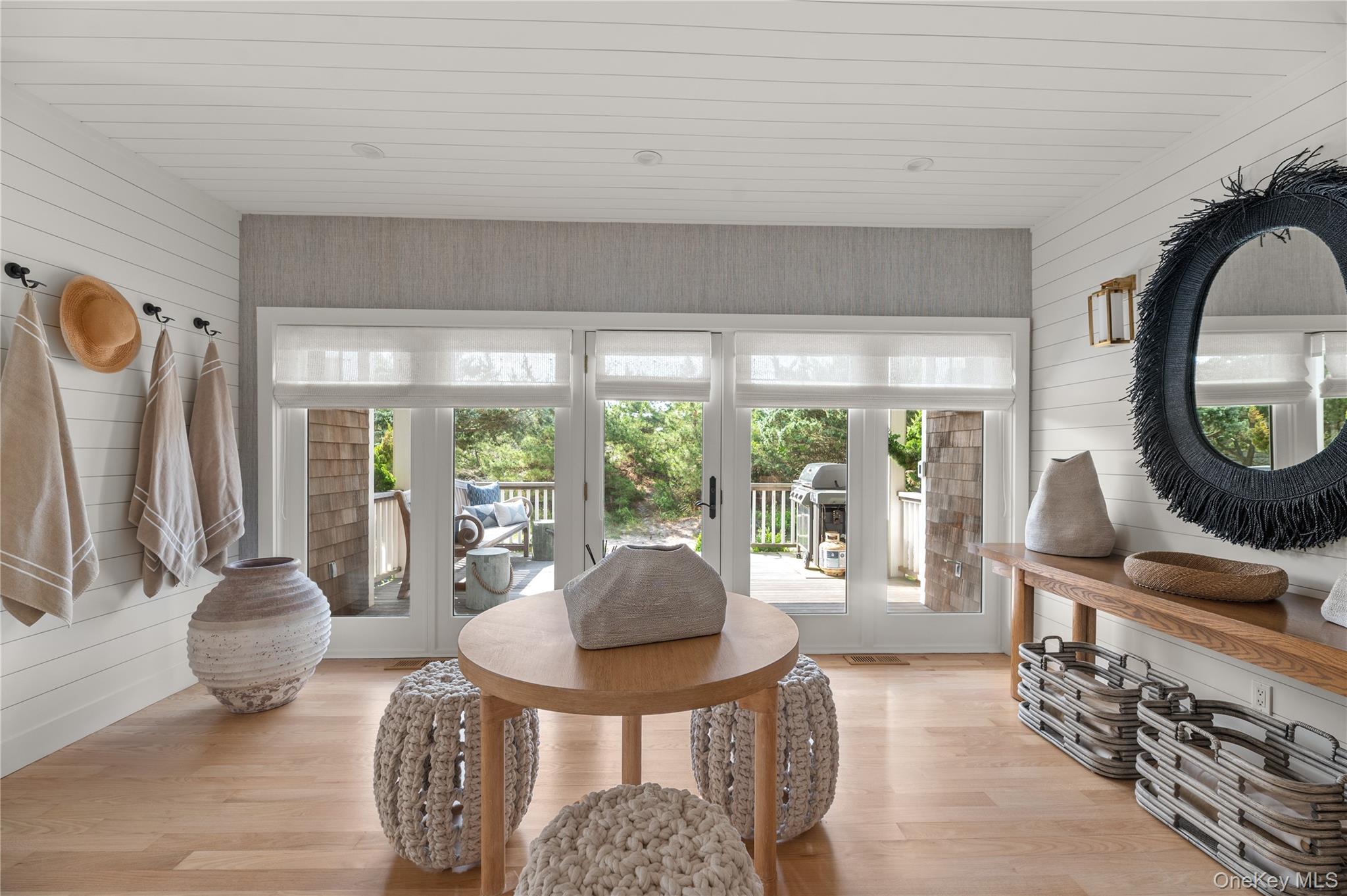 1005 Surf View Ocean Beach, NY 11770 - Photo 4 of 43 a living room with furniture and a large window