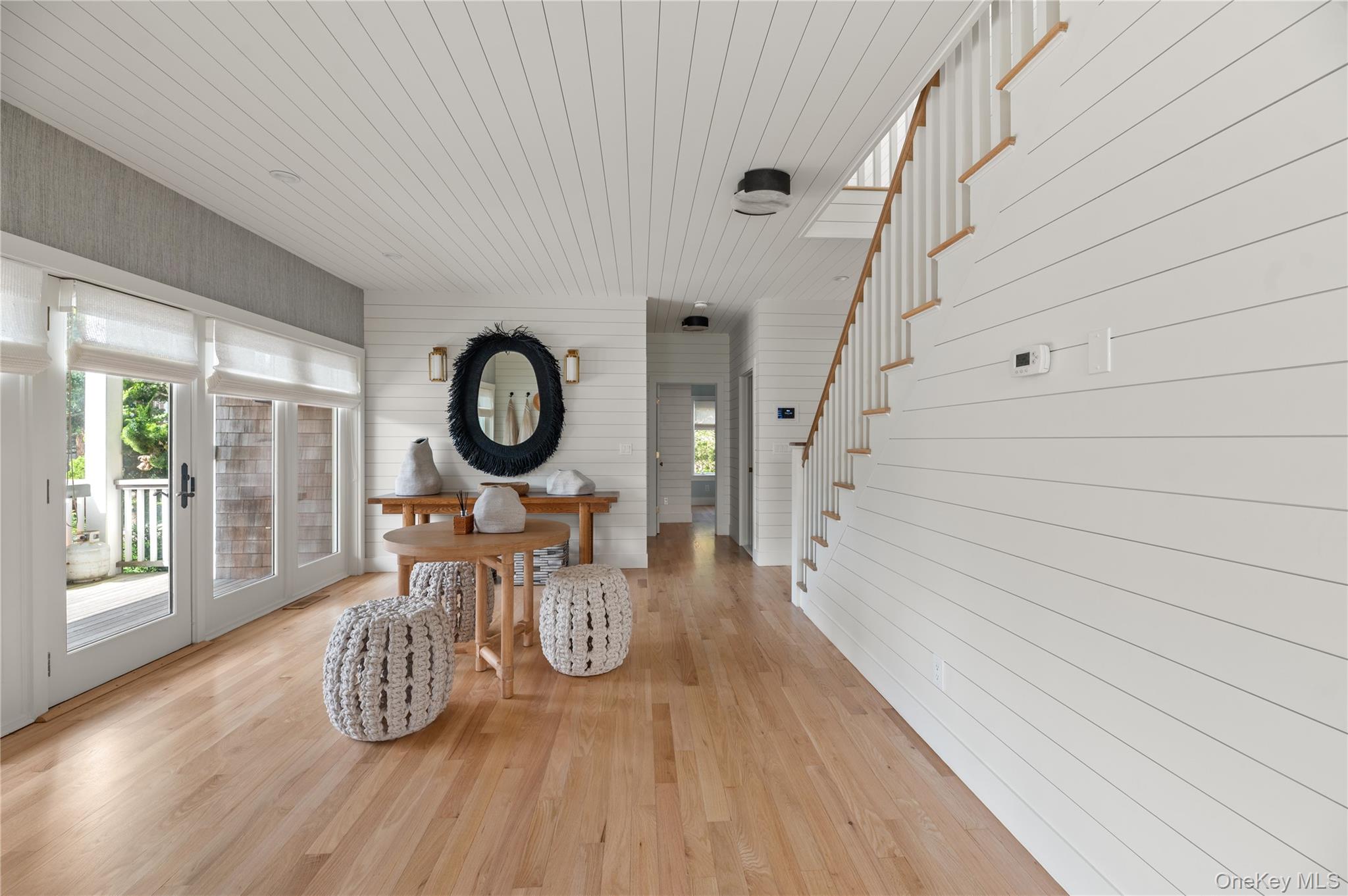 1005 Surf View Ocean Beach, NY 11770 - Photo 5 of 43 a view of a livingroom with furniture and wooden floor