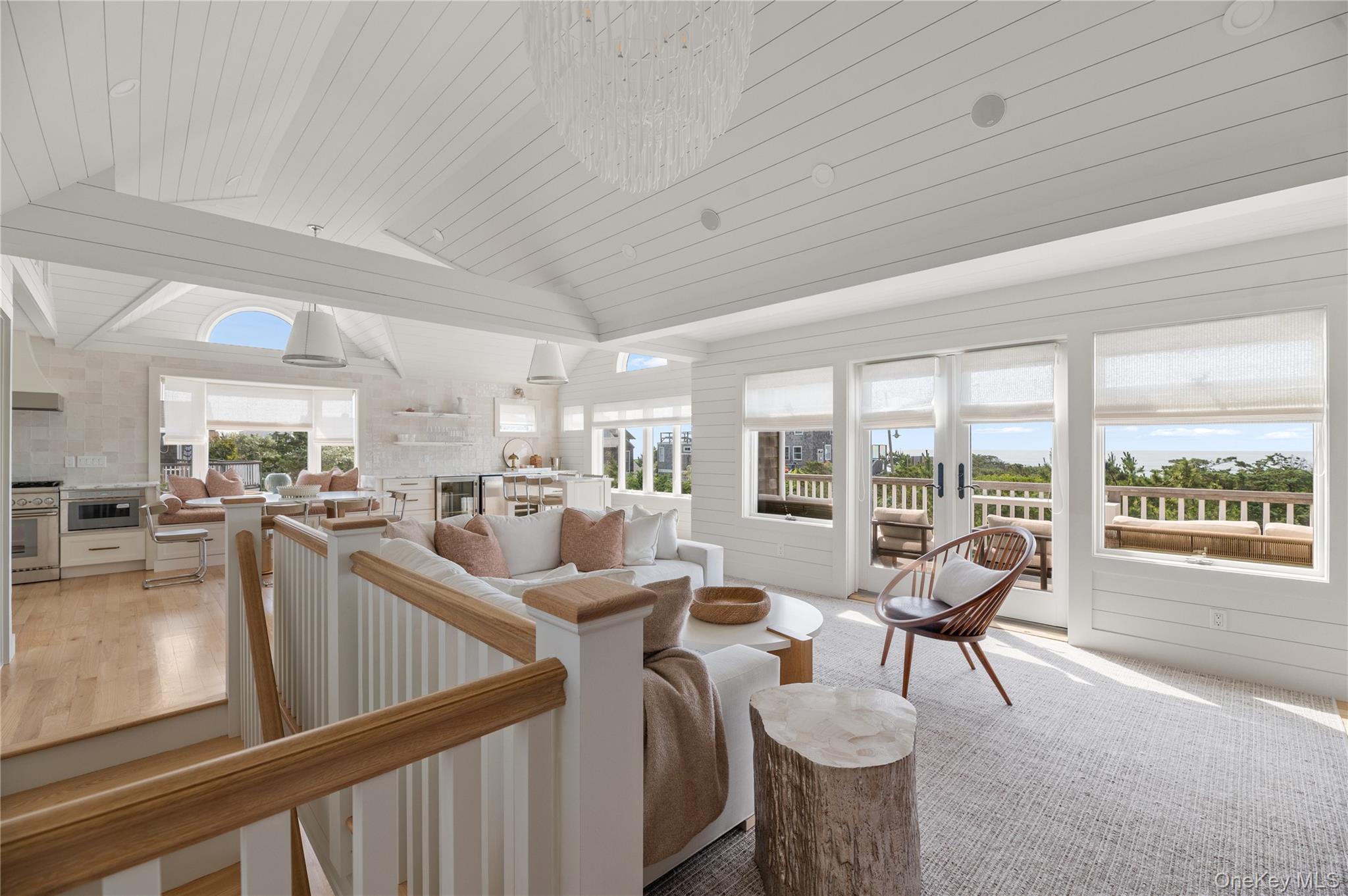 1005 Surf View Ocean Beach, NY 11770 - Photo 7 of 43 a living room with furniture and a large window with outer view