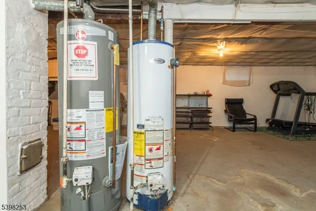 a view of a storage & utility room with washer and dryer
