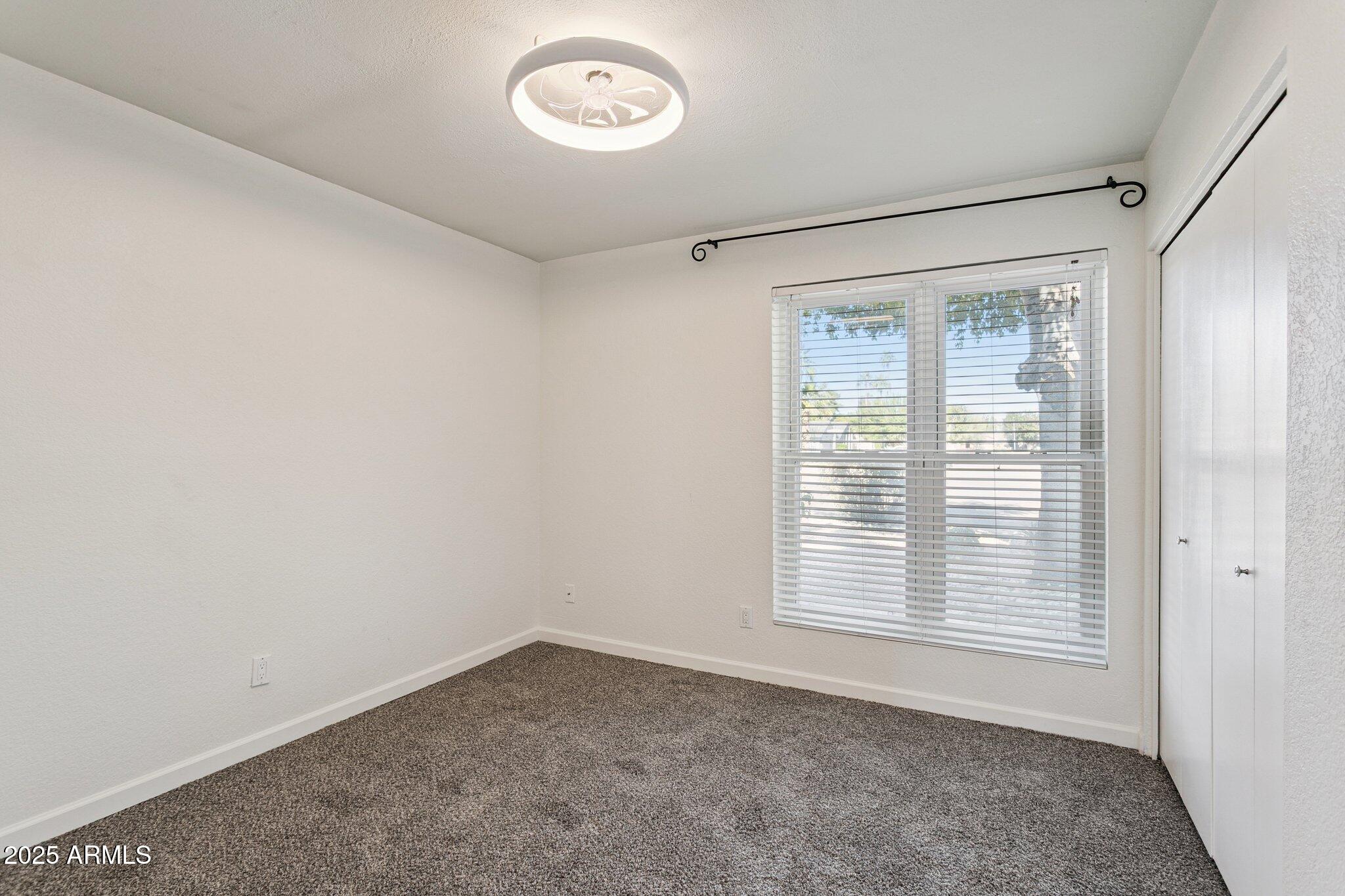 4915 East Everett Drive Scottsdale, AZ 85254 - Photo 28 of 39 a view of an empty room with a window