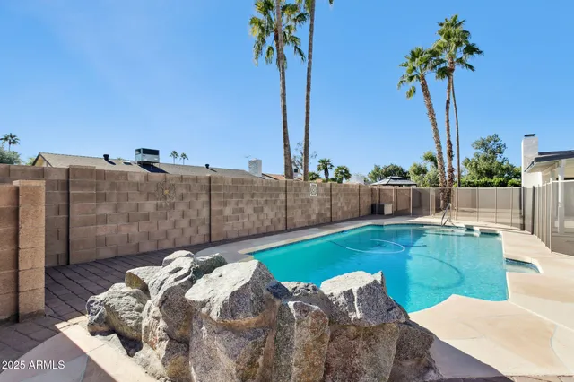 a view of a backyard with plants