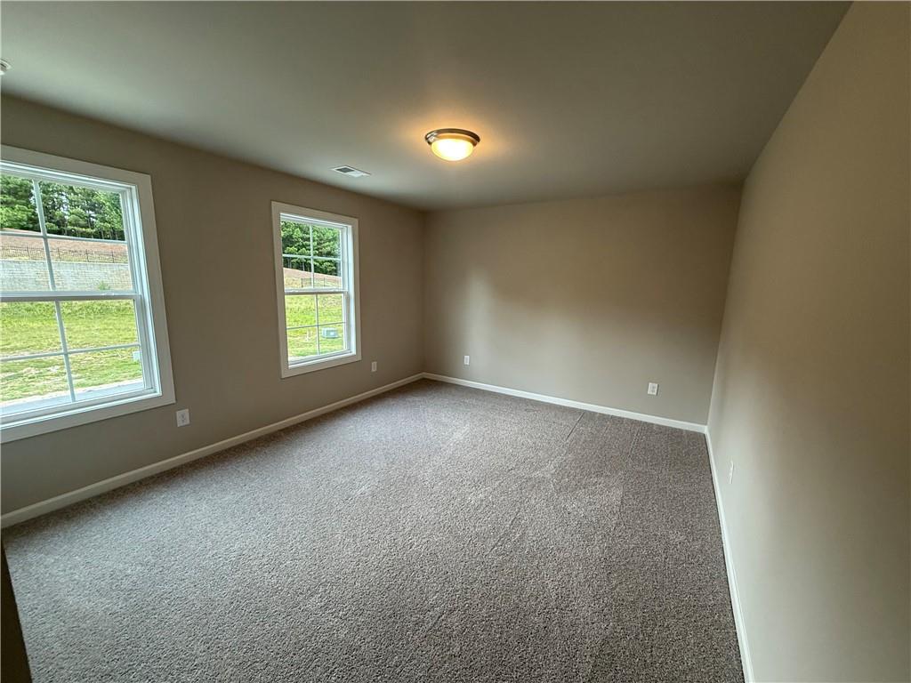 329 Lakeside Drive Canton, GA 30114 - Photo 14 of 34 an empty room with windows