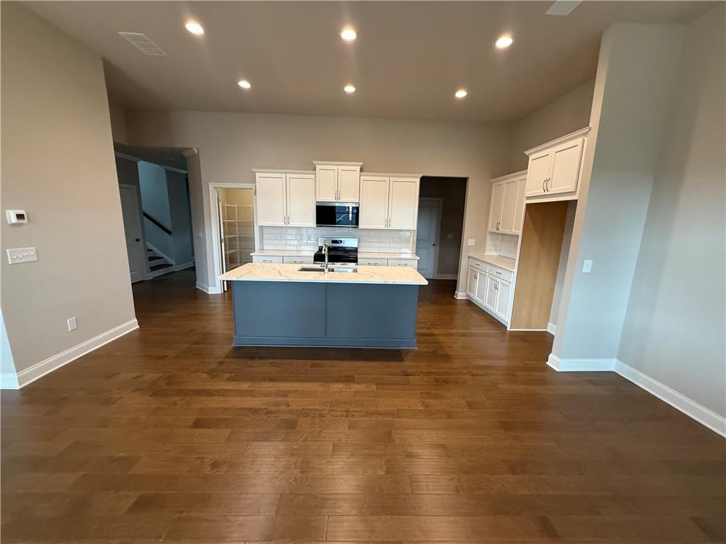 329 Lakeside Drive Canton, GA 30114 - Photo 5 of 34 a view of kitchen with sink microwave and refrigerator