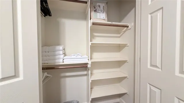 a kitchen with a sink and a refrigerator