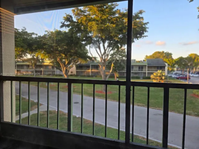 a view of a street from a balcony