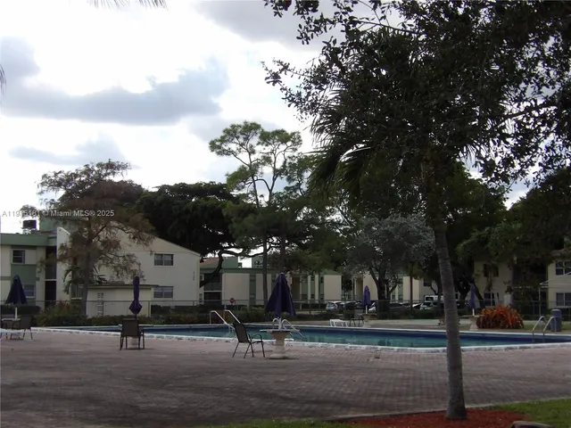 a park with benches and trees