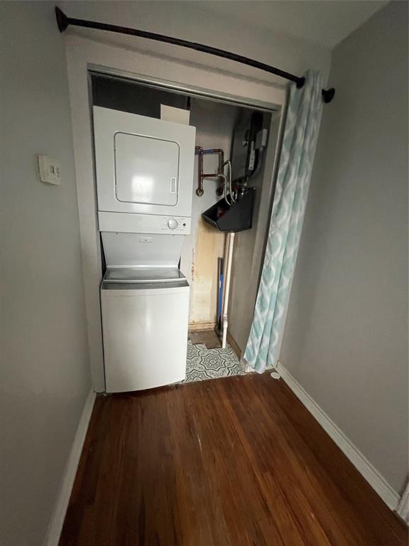 2517 Amelia Street Dallas, TX 75235 - Photo 4 of 7 a view of empty room with wooden floor and cabinet
