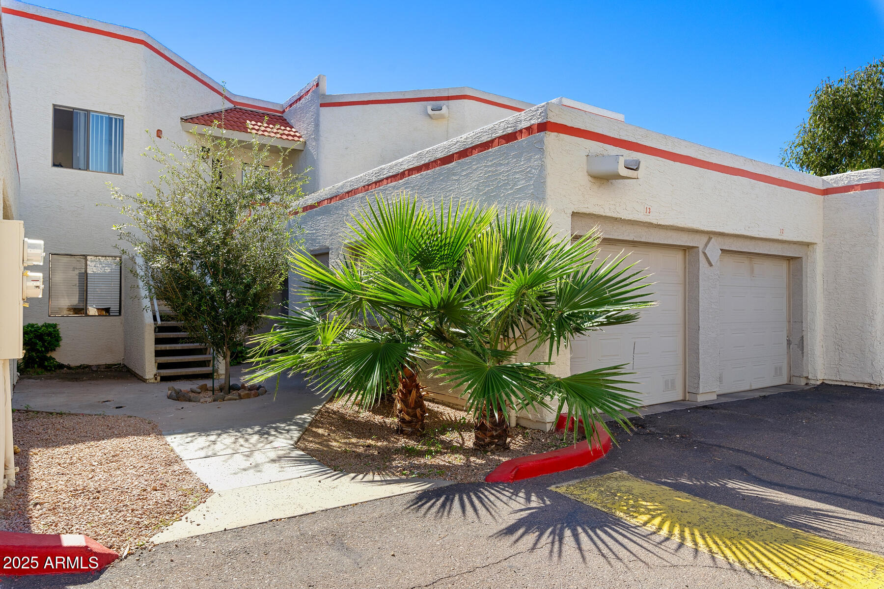 835 North Granite Reef Road, Unit 12 Scottsdale, AZ 85257 - Photo 23 of 23 a view of a house with backyard and sitting area