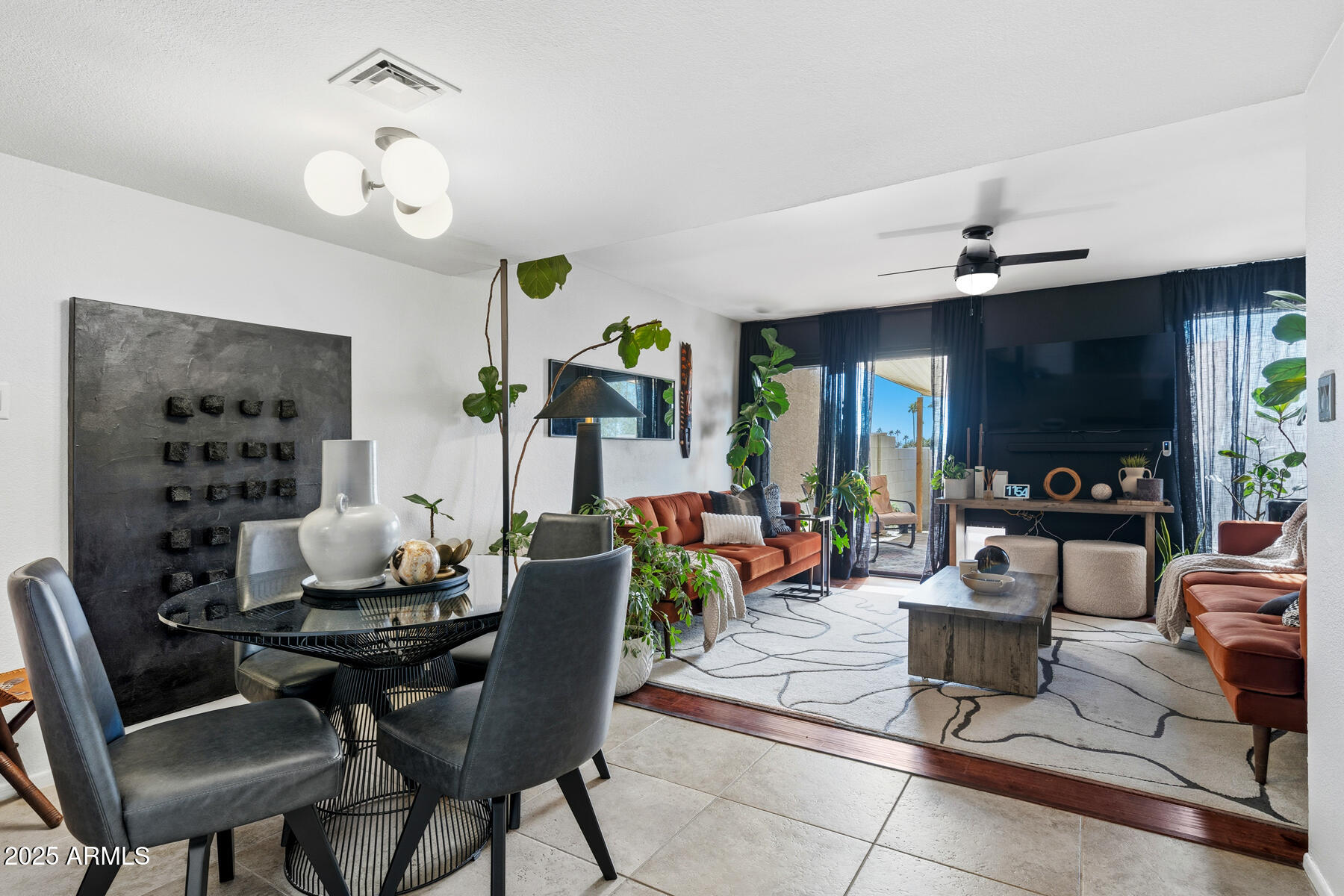 835 North Granite Reef Road, Unit 12 Scottsdale, AZ 85257 - Photo 6 of 23 a view of a dining room with furniture