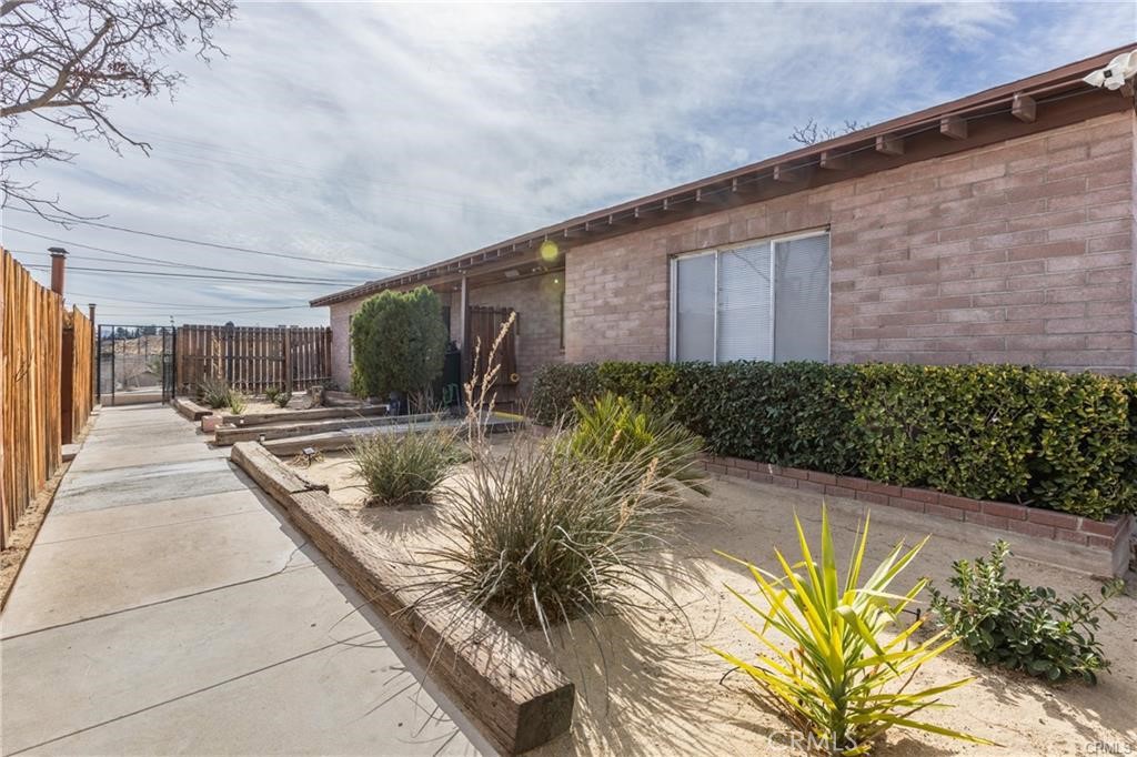 15521 4th Street Victorville, CA 92395 - Photo 1 of 27 a view of swimming pool with outdoor seating and plants
