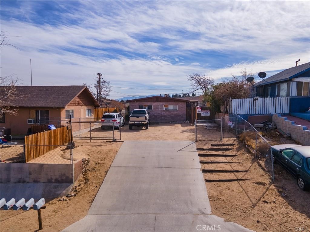15521 4th Street Victorville, CA 92395 - Photo 2 of 27 a view of a house with sitting area
