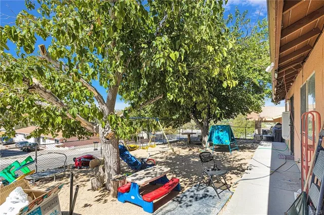 a view of parking space in the back yard
