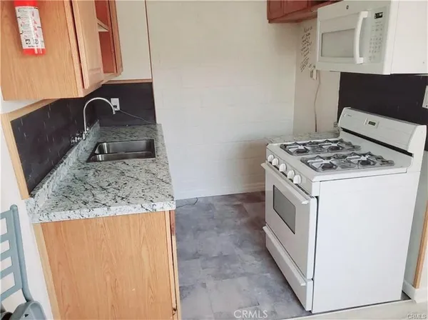 a utility room with washer and dryer