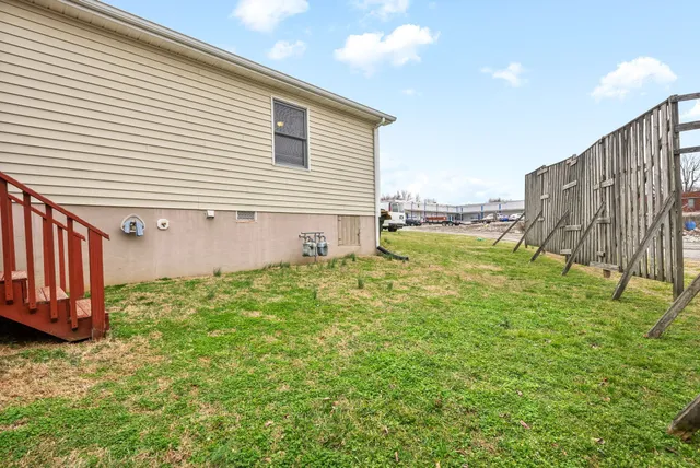 a view of a backyard with garden