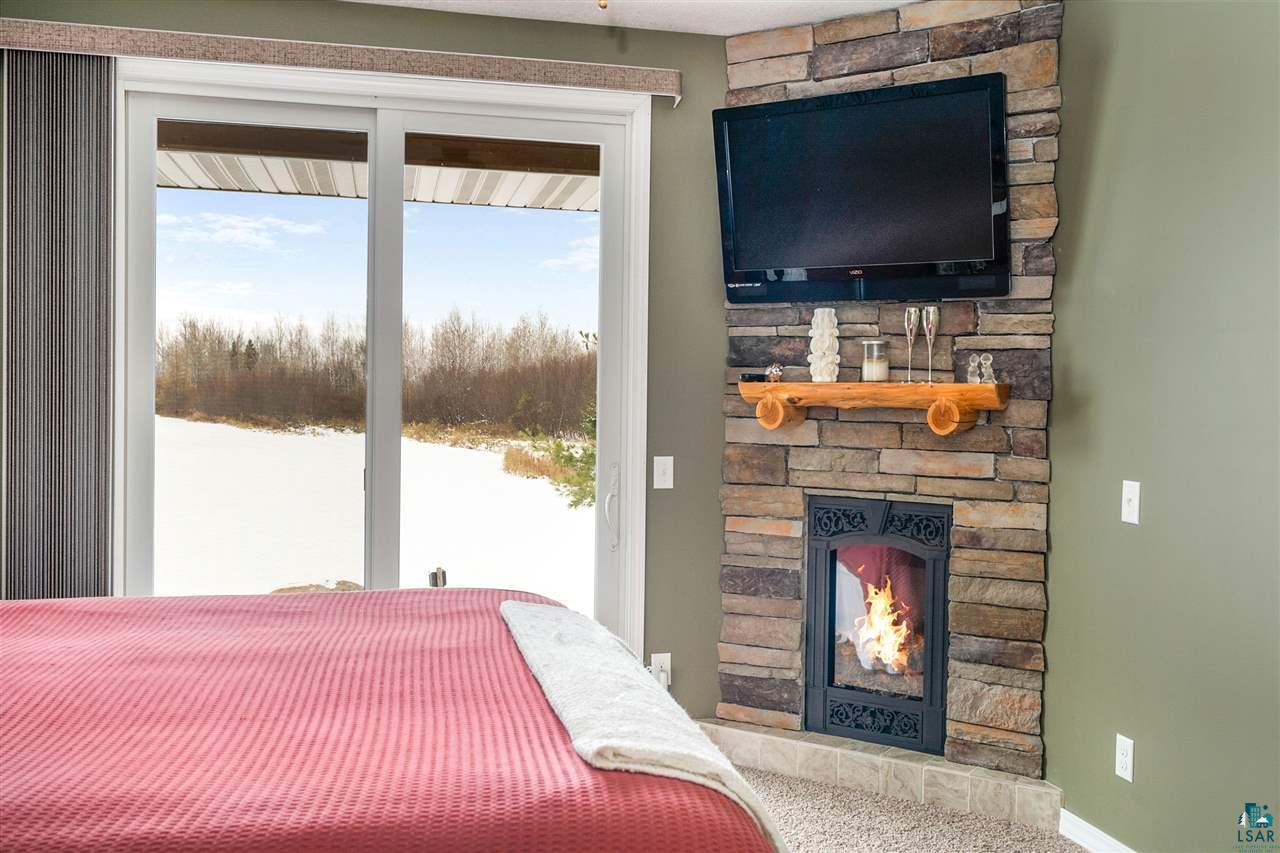 134 West Harney Road Esko, MN 55733 - Photo 24 of 50 Cozy up to the fireplace while watching a movie!