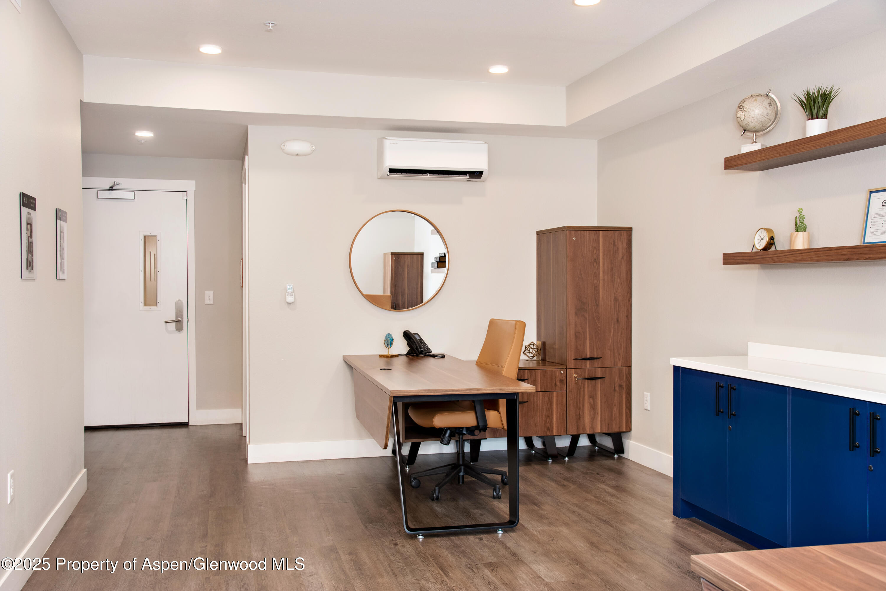 253 Wulfsohn Road, Unit 301 Glenwood Springs, CO 81601 - Photo 13 of 45 a view of a room that has a table and chairs in it