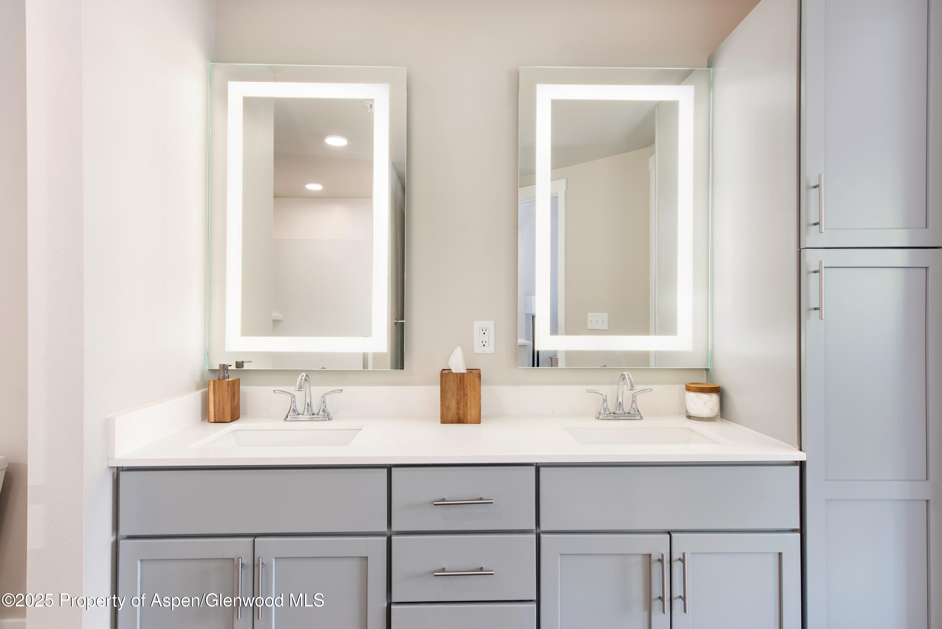 253 Wulfsohn Road, Unit 301 Glenwood Springs, CO 81601 - Photo 23 of 45 a bathroom with a sink and a mirror