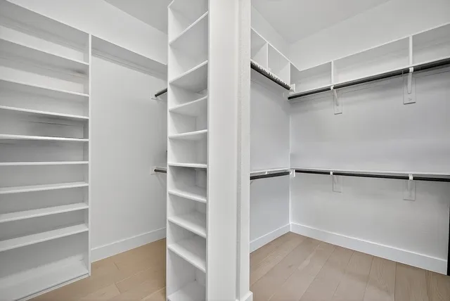 a view of an empty walk in closet