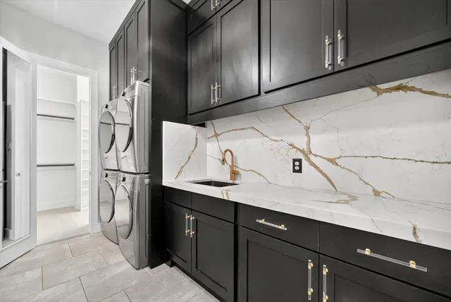 a utility room with cabinets
