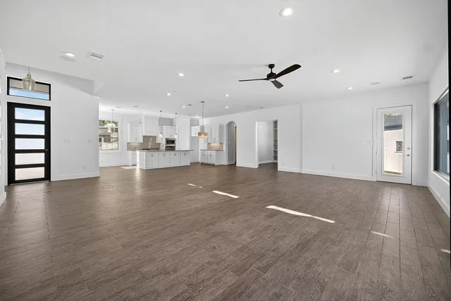 a view of a livingroom with a kitchen