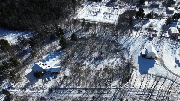 a view of a back yard of the house