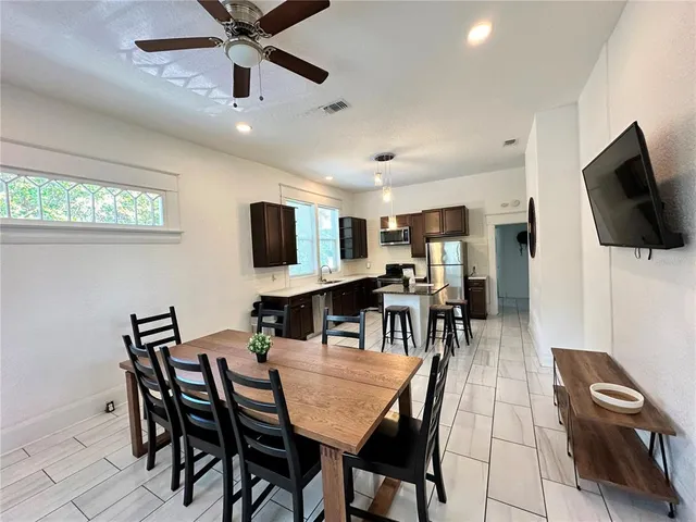 a view of a dining room with furniture