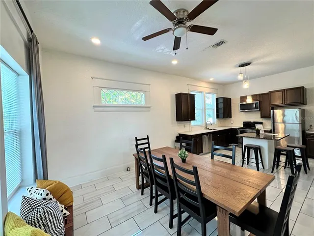 a view of a dining room with furniture