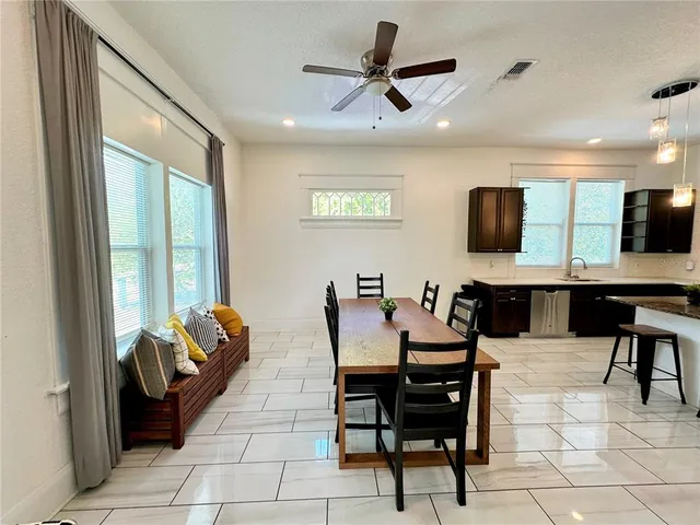 a view of a livingroom with furniture