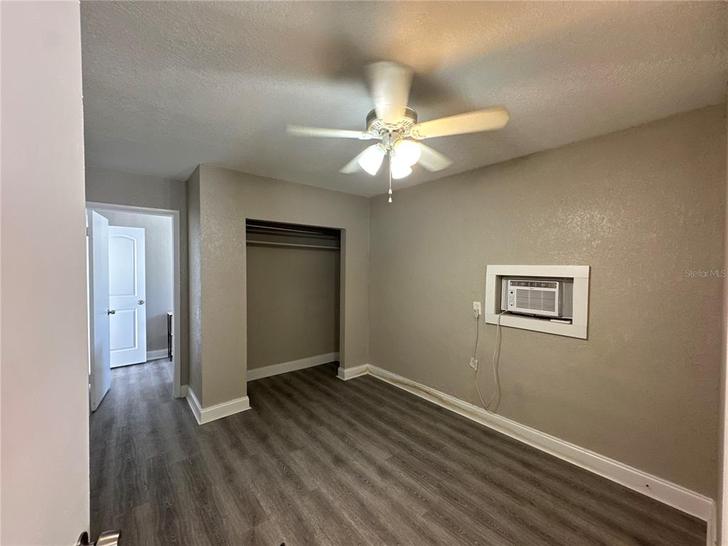 3105 West Spruce Street Tampa, FL 33607 - Photo 45 of 53 wooden floor in an empty room with a window