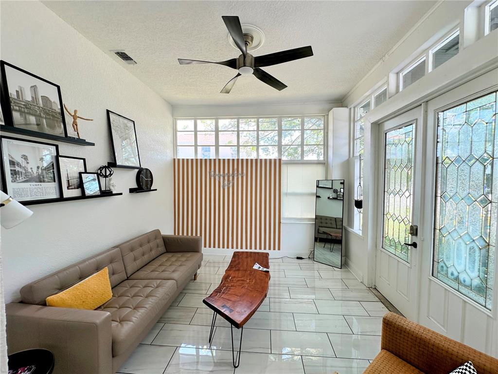 3105 West Spruce Street Tampa, FL 33607 - Photo 8 of 53 a living room with furniture and a window