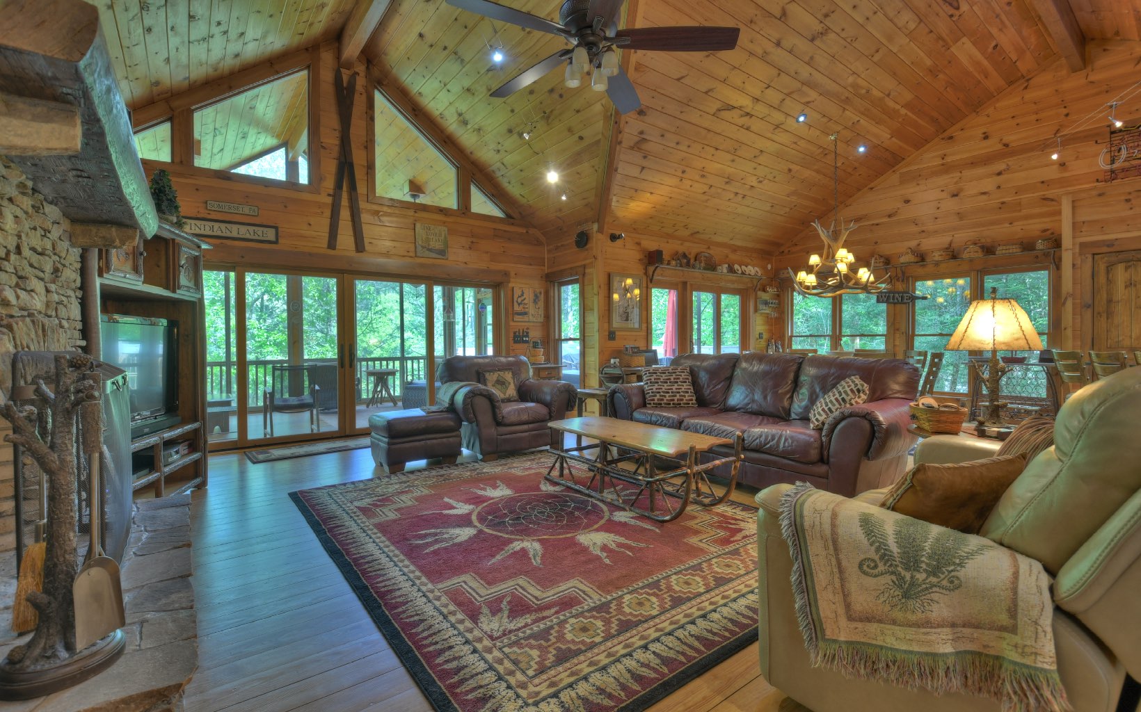 986 Shady Falls Road Blue Ridge, GA 30513 - Photo 54 of 68 a living room with furniture a large window with kitchen view