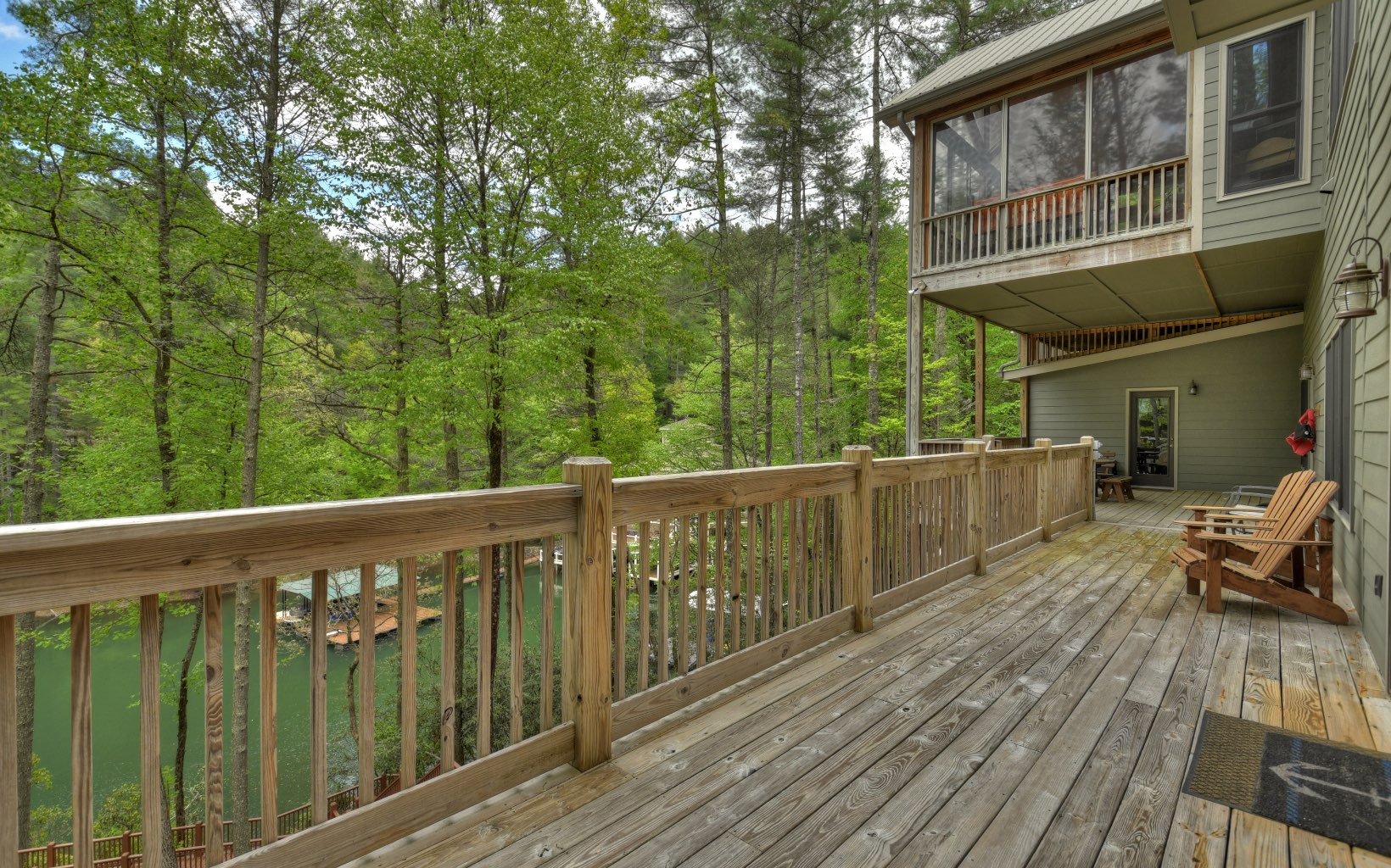 986 Shady Falls Road Blue Ridge, GA 30513 - Photo 59 of 68 a view of a wooden deck with chairs