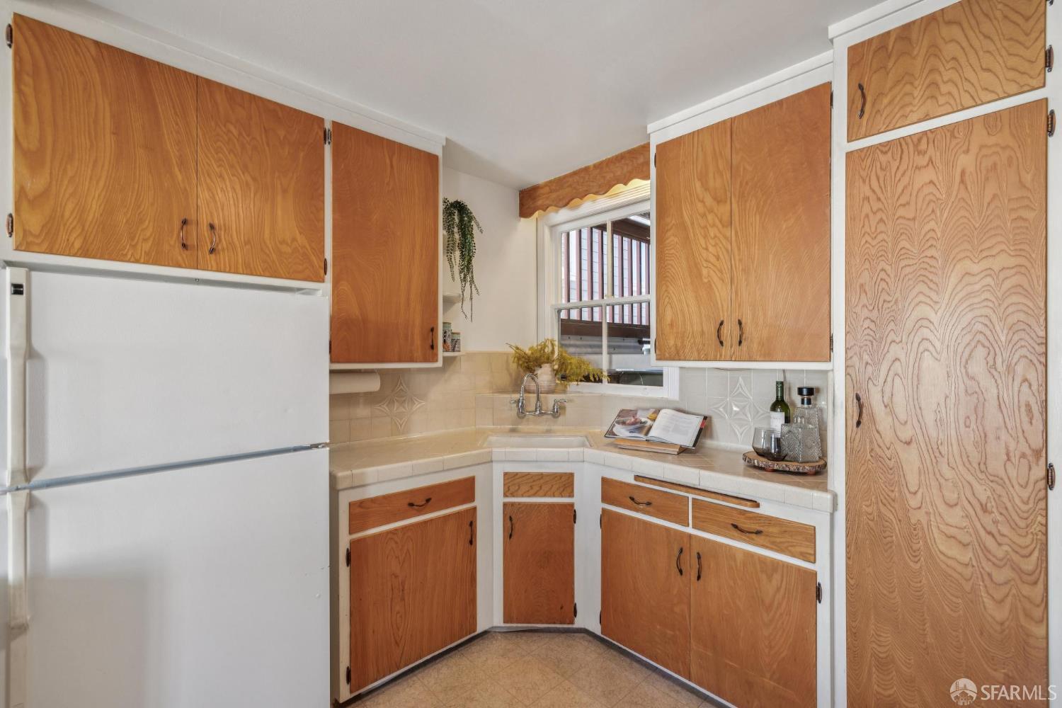 2015-2017 Judah Street San Francisco, CA 94122 - Photo 13 of 58 a bathroom with a sink and a mirror