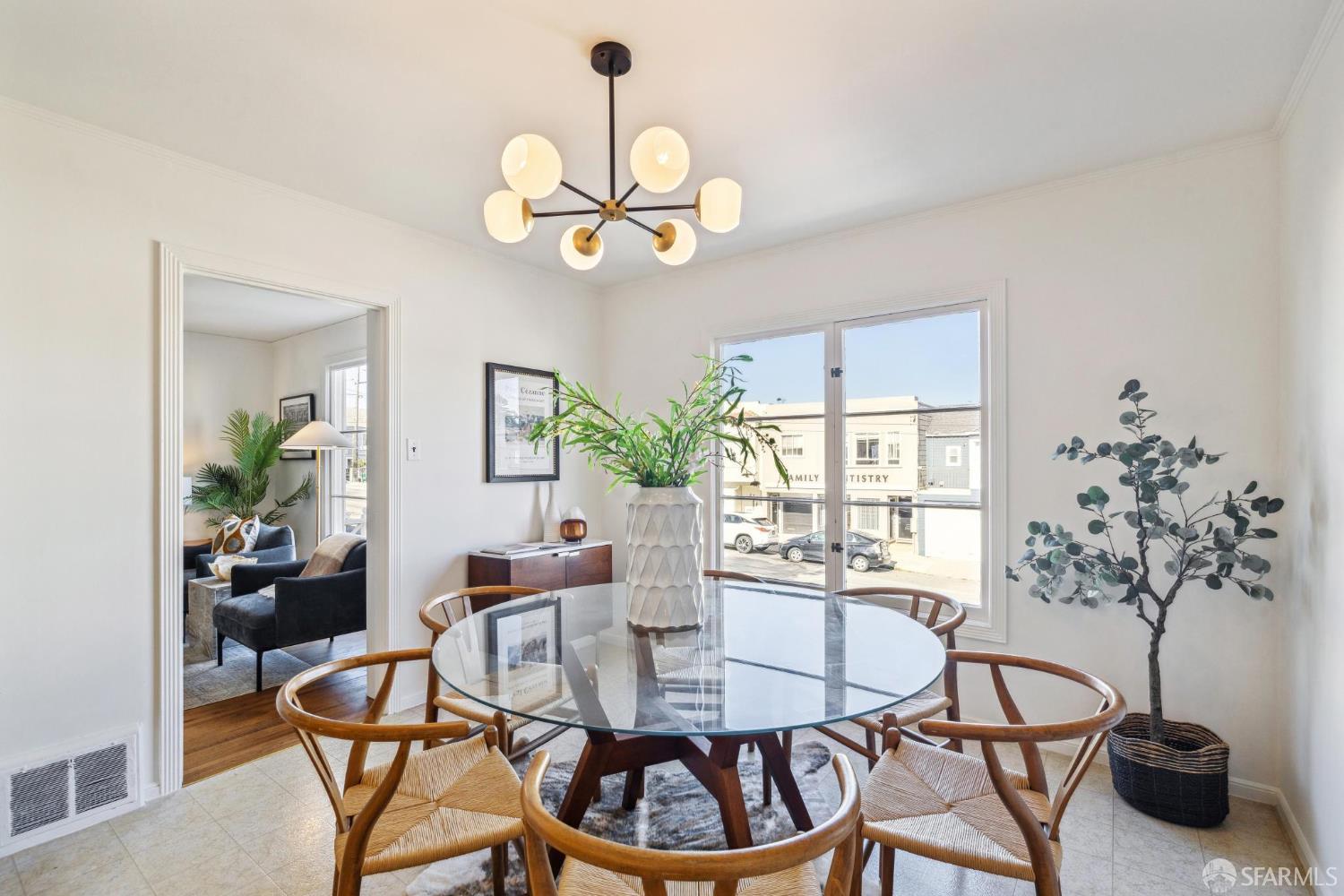 2015-2017 Judah Street San Francisco, CA 94122 - Photo 2 of 58 a view of a dining room with furniture window and wooden floor