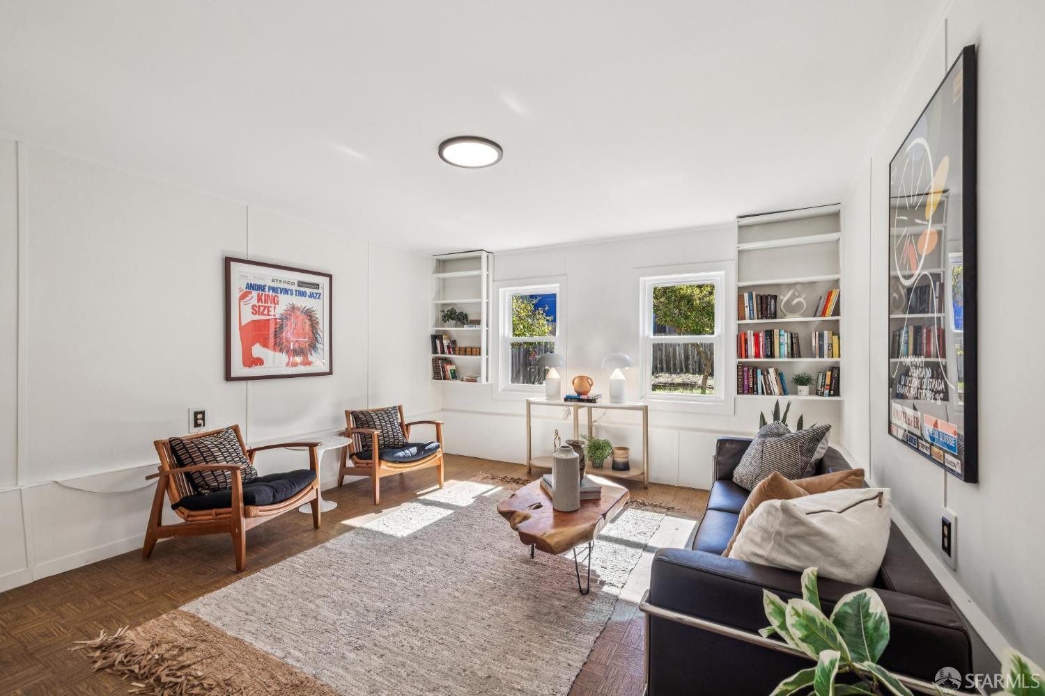 2015-2017 Judah Street San Francisco, CA 94122 - Photo 23 of 58 a living room with furniture a rug and a large window