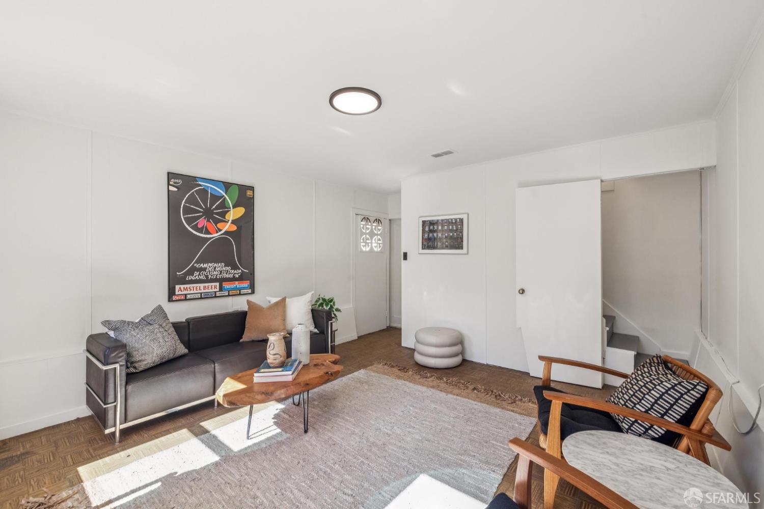 2015-2017 Judah Street San Francisco, CA 94122 - Photo 24 of 58 a living room with furniture and a couch