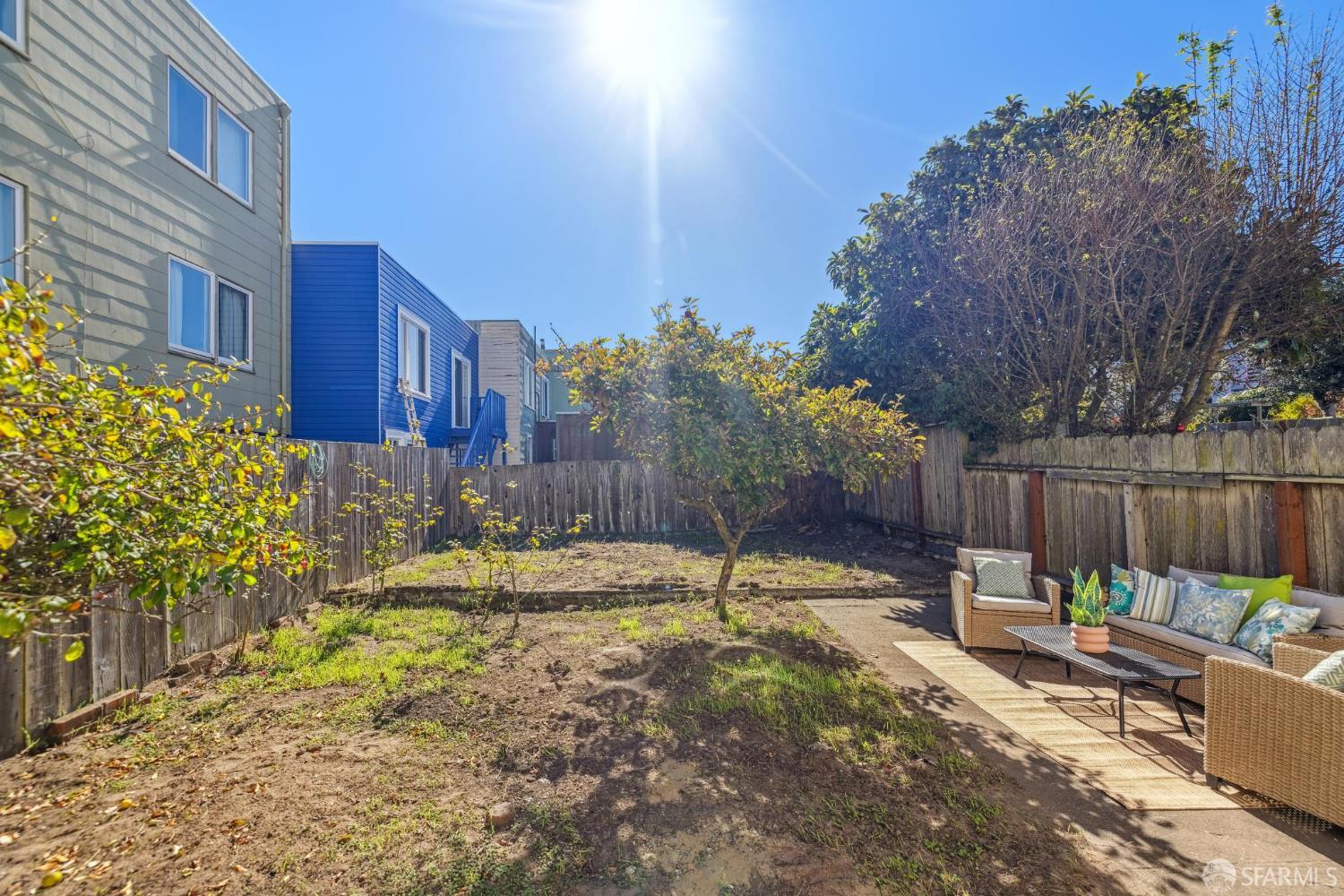 2015-2017 Judah Street San Francisco, CA 94122 - Photo 25 of 58 a backyard of a house with table and chairs