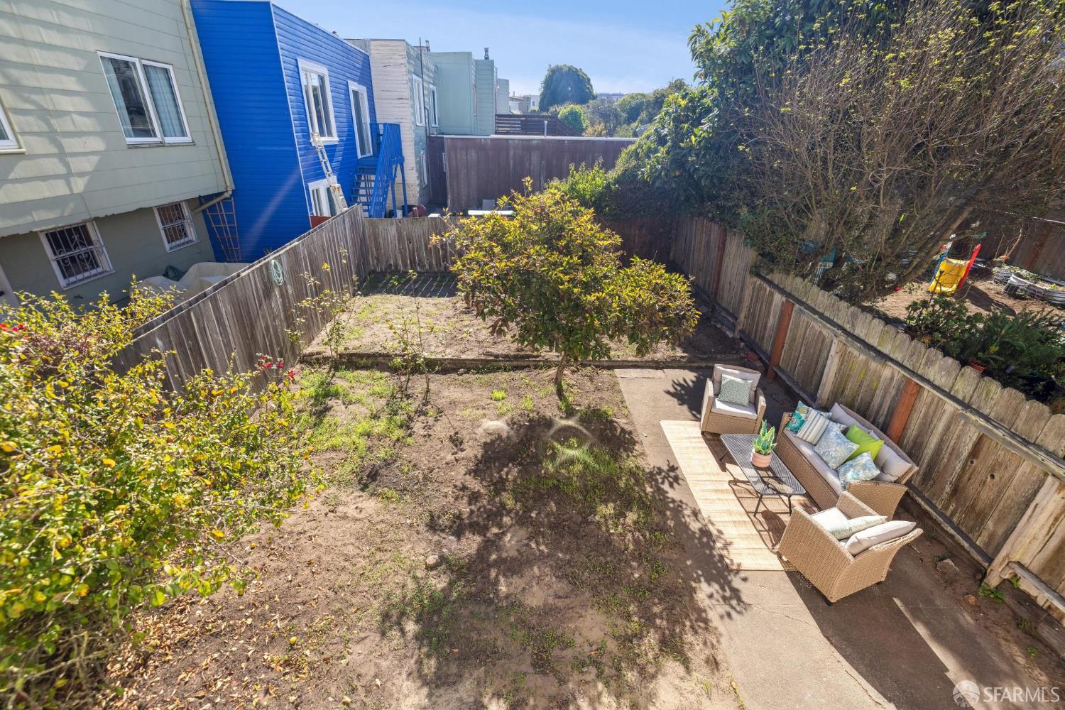 2015-2017 Judah Street San Francisco, CA 94122 - Photo 26 of 58 a view of a chairs and table in the patio