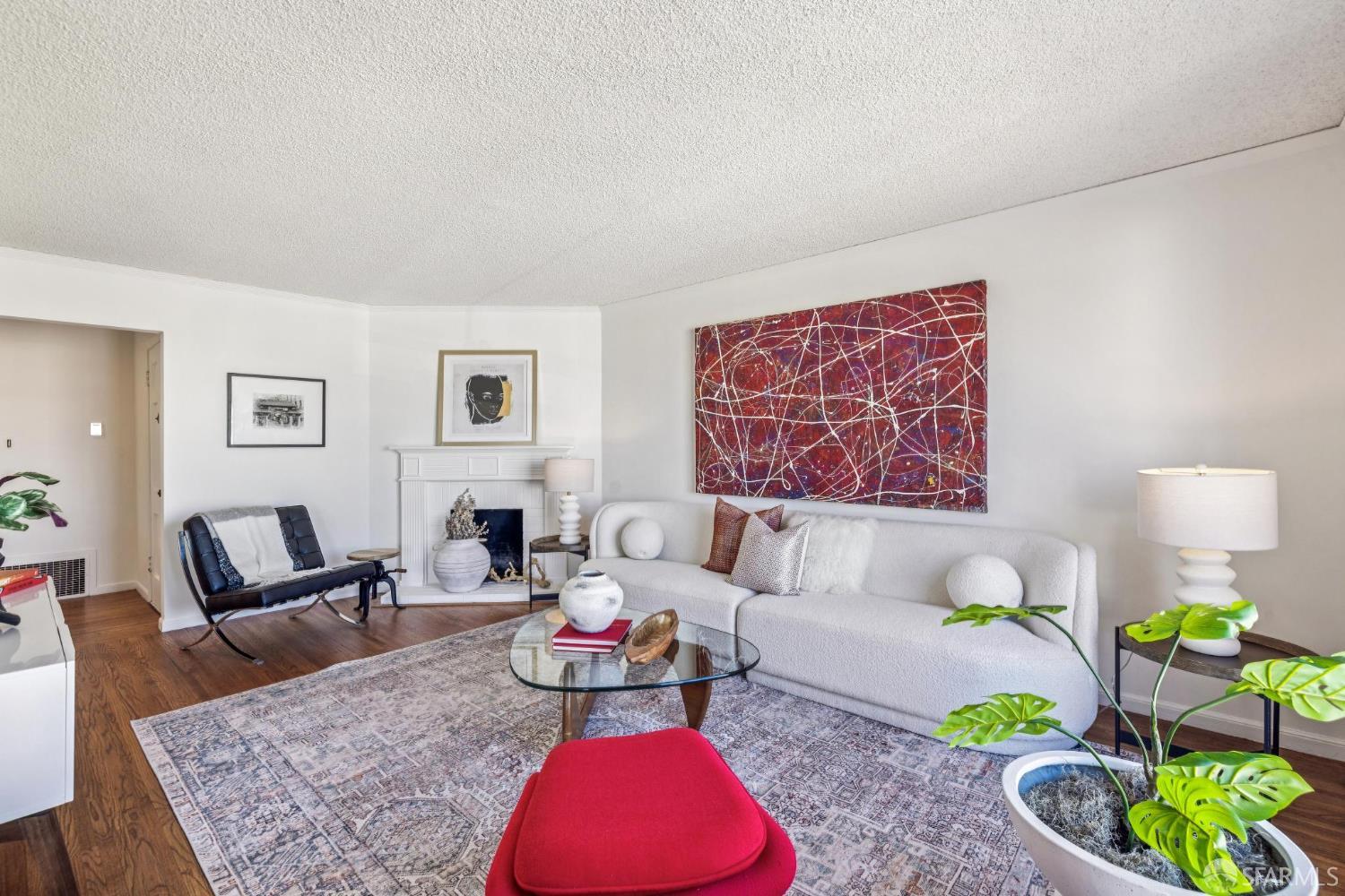 2015-2017 Judah Street San Francisco, CA 94122 - Photo 33 of 58 a living room with furniture rug and lamp