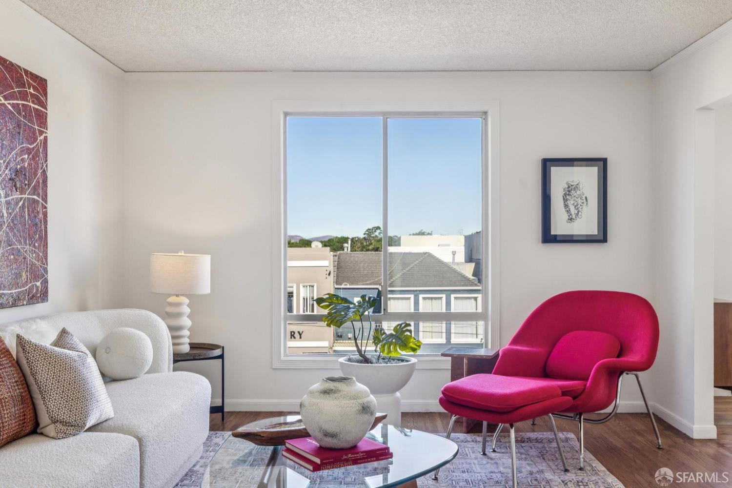 2015-2017 Judah Street San Francisco, CA 94122 - Photo 35 of 58 a living room with furniture a rug and a window