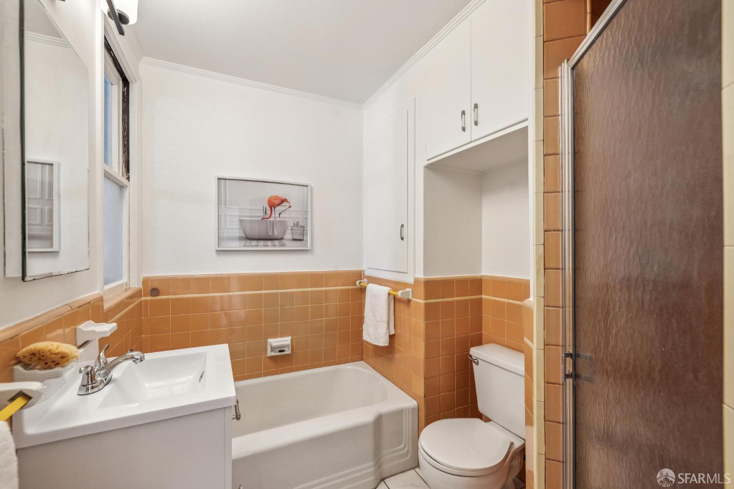 2015-2017 Judah Street San Francisco, CA 94122 - Photo 42 of 58 a bathroom with a sink and a mirror