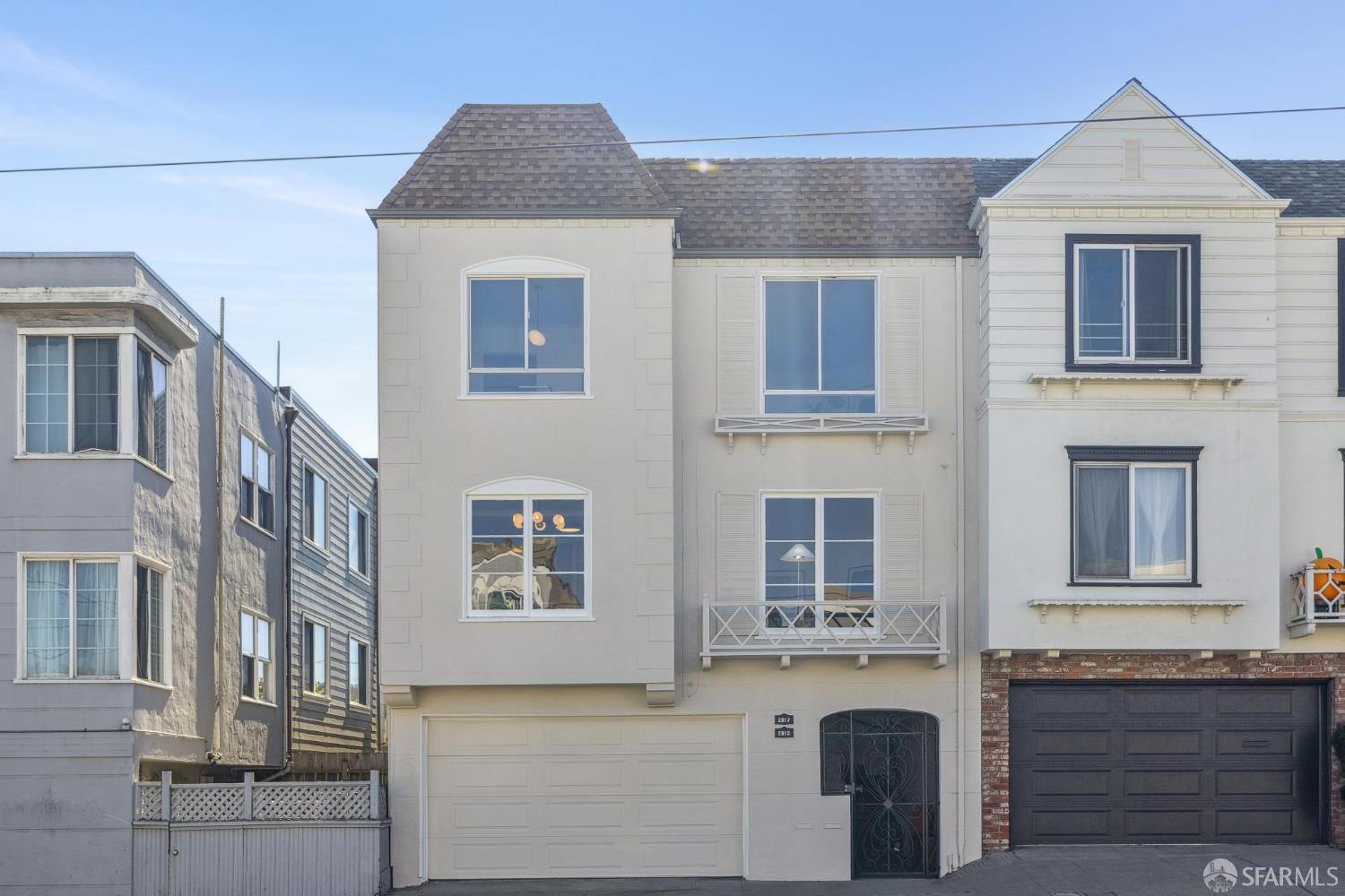 2015-2017 Judah Street San Francisco, CA 94122 - Photo 47 of 58 a front view of a house with large windows