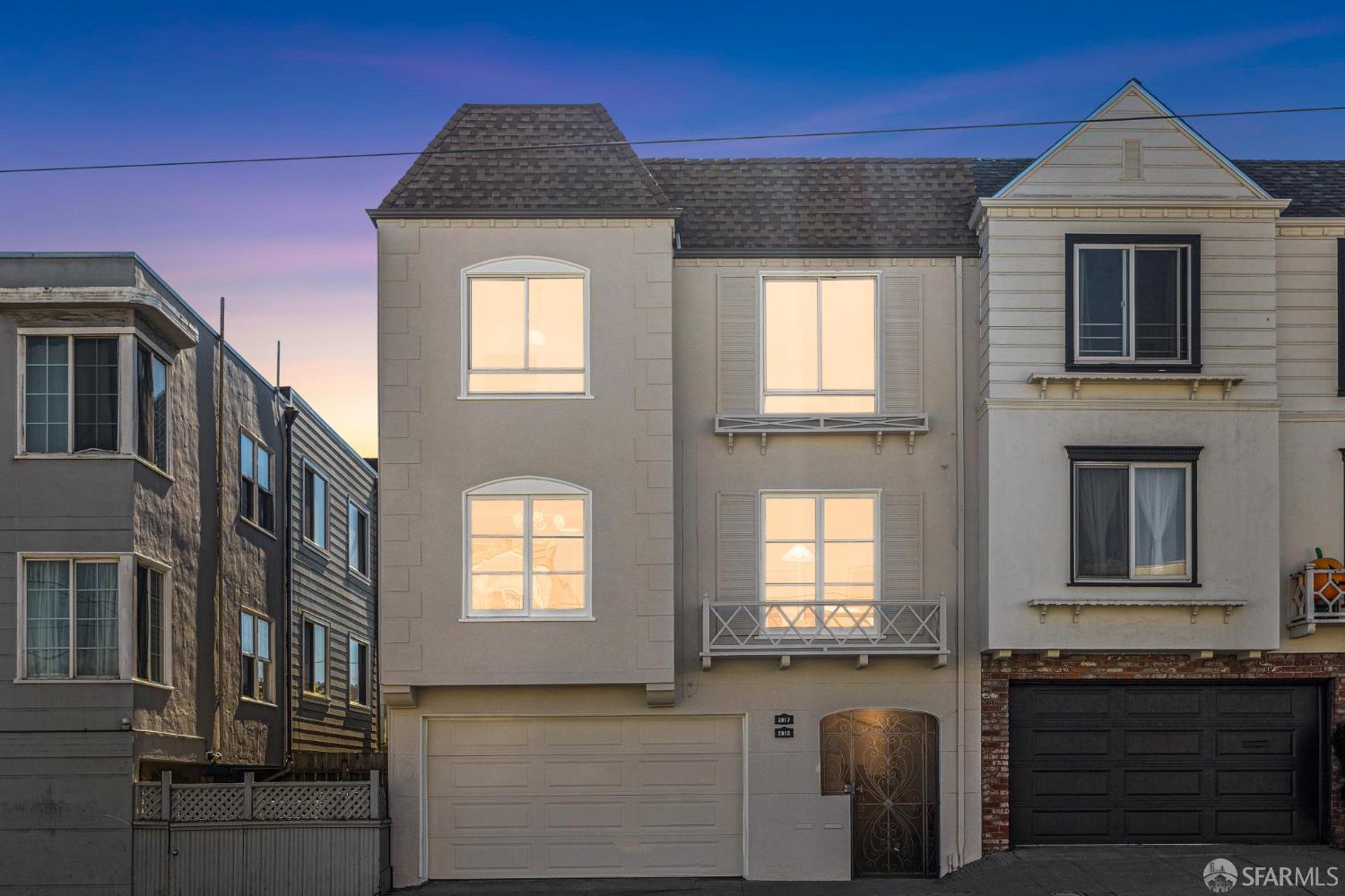 2015-2017 Judah Street San Francisco, CA 94122 - Photo 56 of 58 a front view of a house with many windows