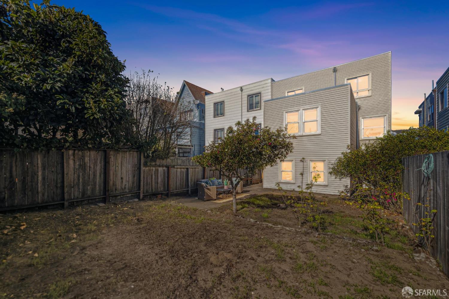 2015-2017 Judah Street San Francisco, CA 94122 - Photo 57 of 58 a view of a house with a yard and plants