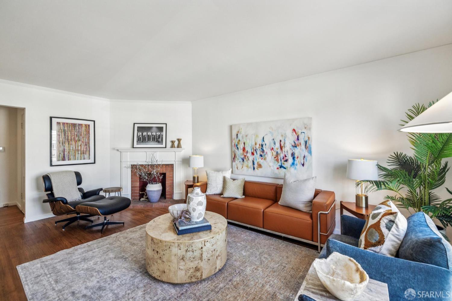 2015-2017 Judah Street San Francisco, CA 94122 - Photo 6 of 58 a living room with furniture and a fireplace