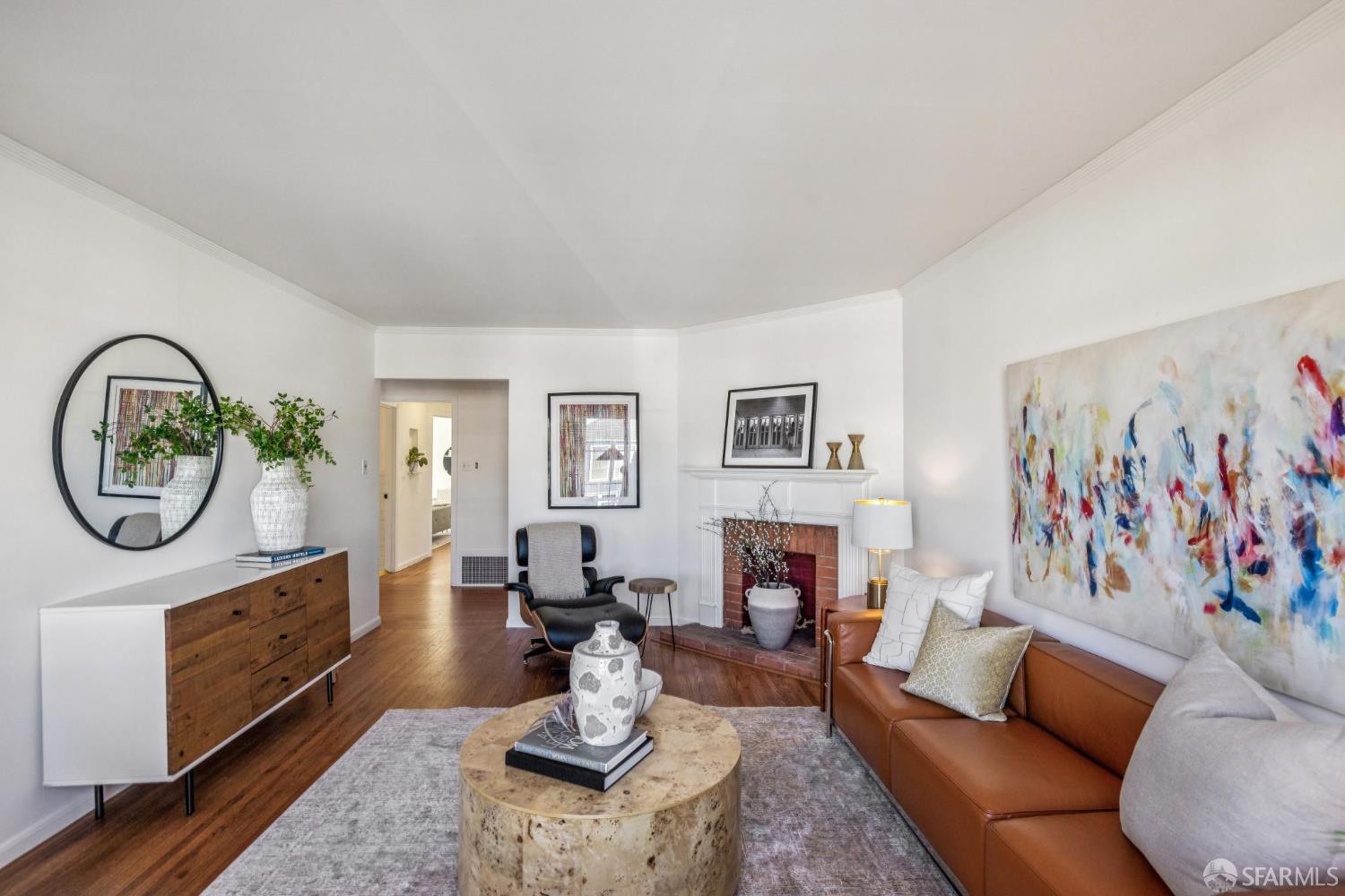 2015-2017 Judah Street San Francisco, CA 94122 - Photo 7 of 58 a living room with furniture a table and a fireplace