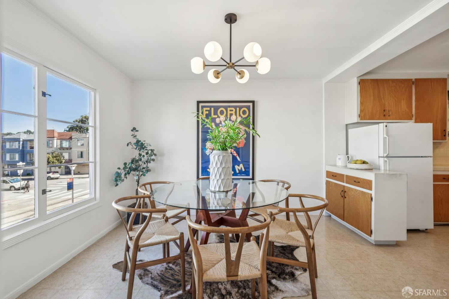 2015-2017 Judah Street San Francisco, CA 94122 - Photo 9 of 58 a view of a dining room with furniture and a chandelier