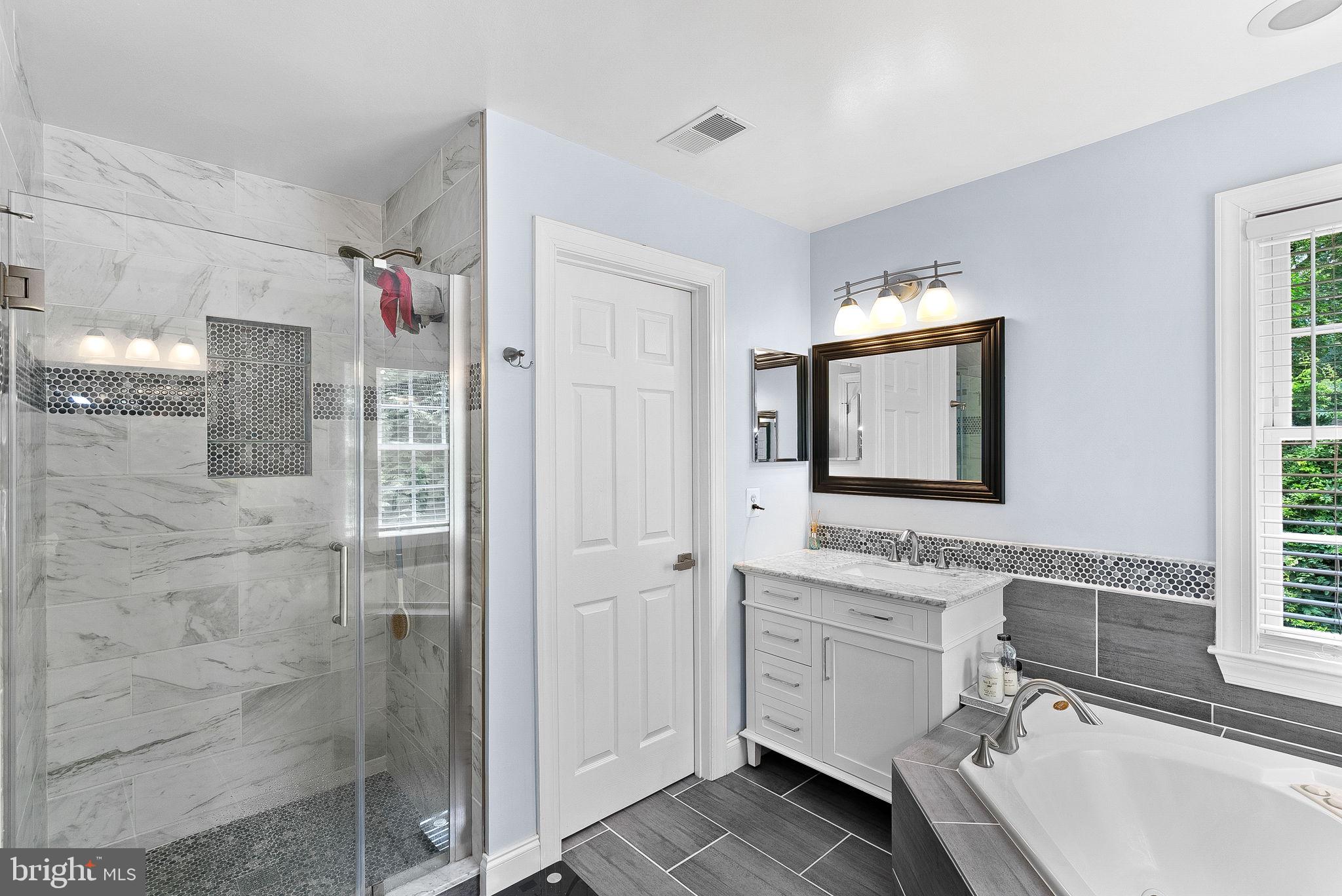 7214 Calamo Street Springfield, VA 22150 - Photo 49 of 77 Walk-in shower and vanity
