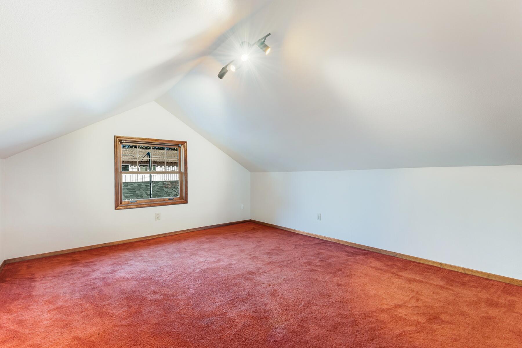 1588 Northwest Awbrey Road Bend, OR 97703 - Photo 18 of 28 an empty room with a window